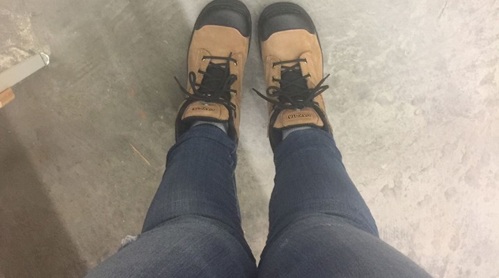 Feet wearing workboots