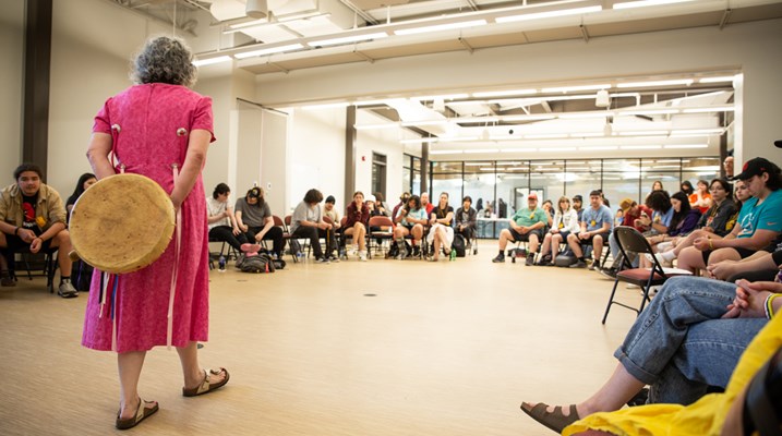 Woman standing in front of a group 