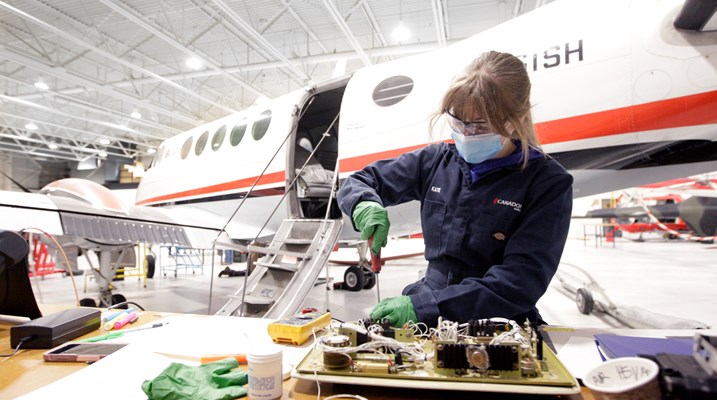 Student working on a plane