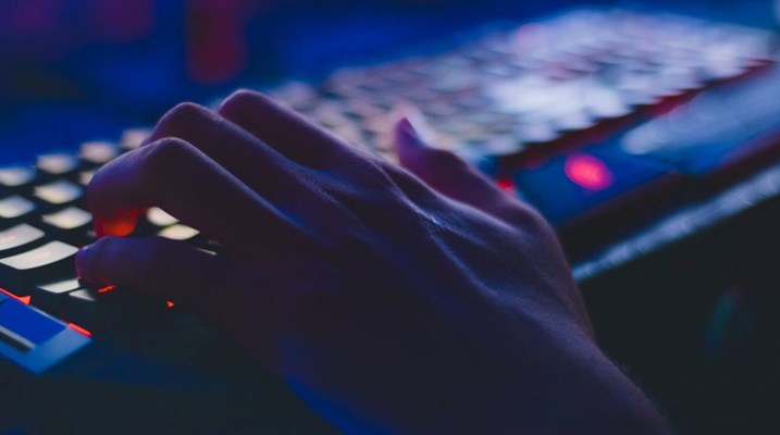 hand typing on a keyboard 