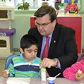 corderre having breakfast with a kid