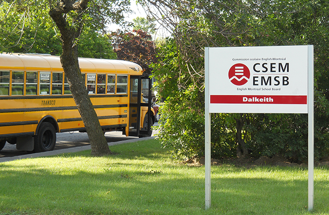 School buses parked in a row outside of Dalkeith Elementary School