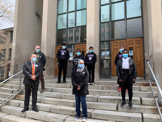 group of people in front of court house