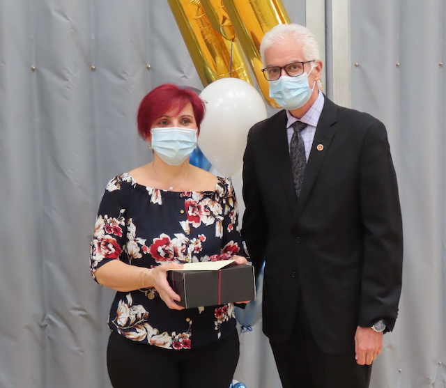 volunteer taking her award