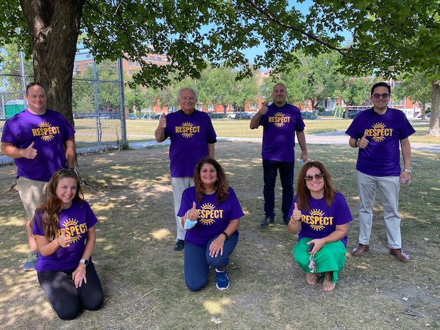 group of people wearing tshirt -respect on it