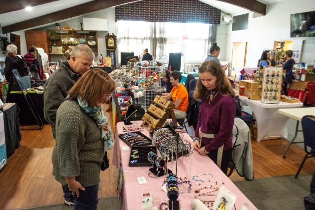 Sarah Aspler, artist, jewelry designer, sells her jewelry at the Curling Club in Baie-D'Urfé on October 19.    Photo: Andreas Kurz  