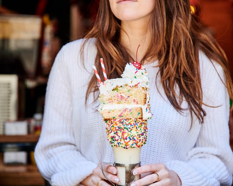 At the stand-alone Shake Bar—the first in New York—guests can get a glimpse into the magic of making one of Black Tap’s famous milkshake creations.