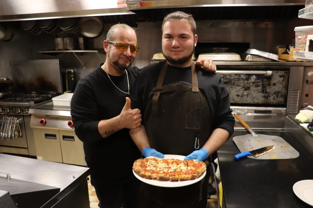 Chef Eugenio Nicita (left) with his son and line chef, Corrado Nicita (right) at their family restaurant San Marzano in Montreal’s RDP on Jan. 6, 2025. (Pamela Pagano, CityNews)