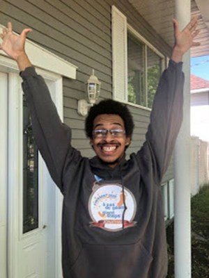 Jonathan Bourassa wearing his graduation sweatshirt from Giant Steps School. (Photos, Karine Daniel)