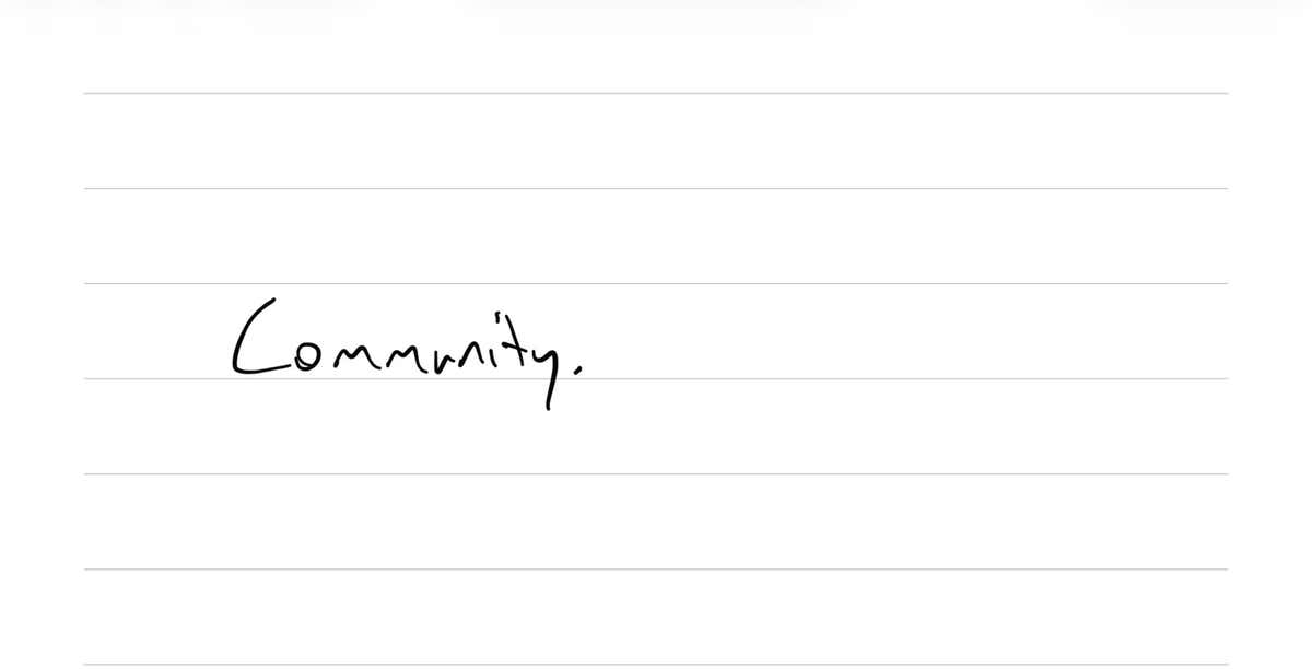The word Community, handwritten on lined paper