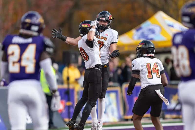 Celebrating with a teammate in the end zone