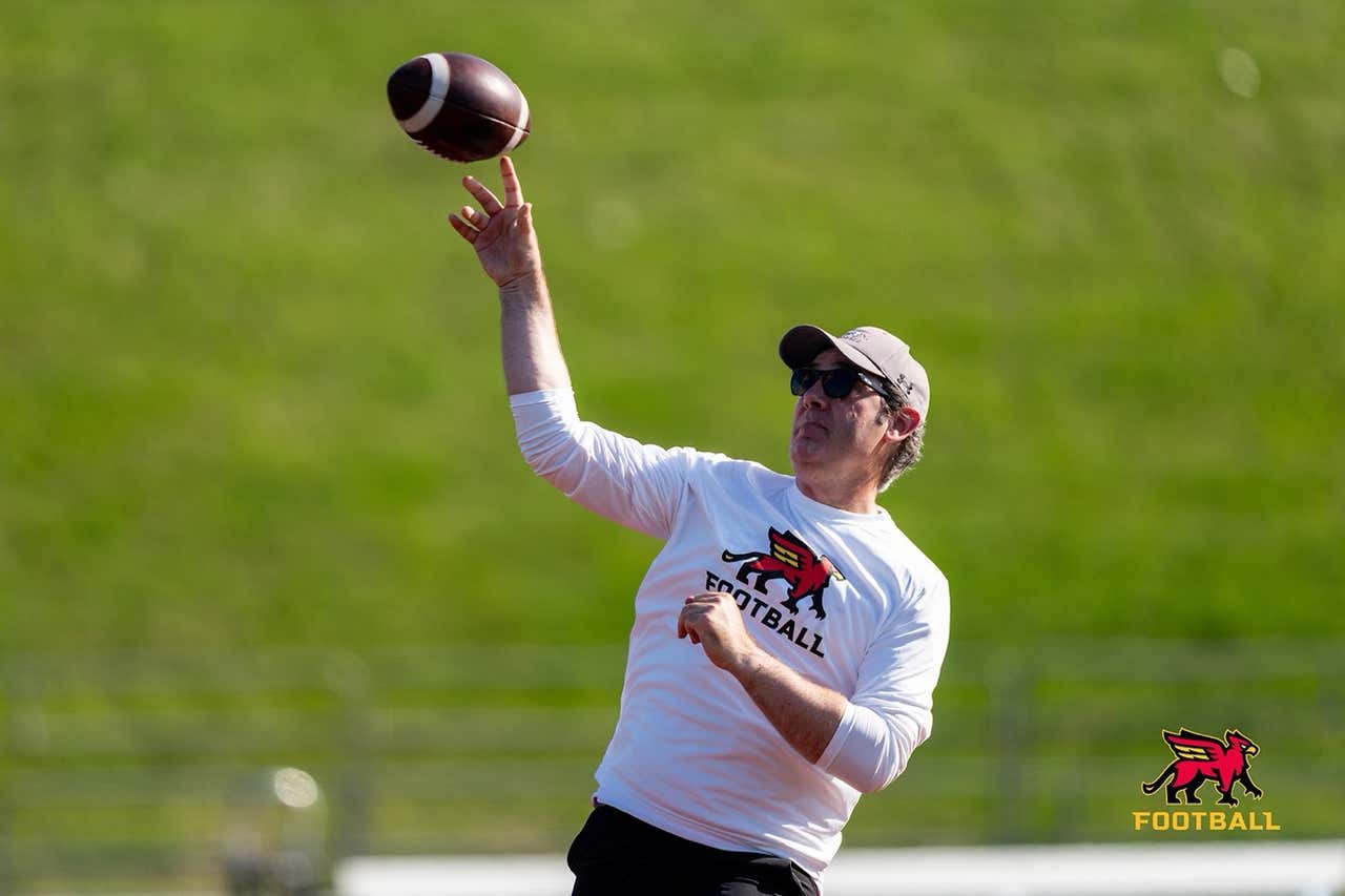 Joel throwing a football — the athlete mindset that shaped a lifetime of health decisions