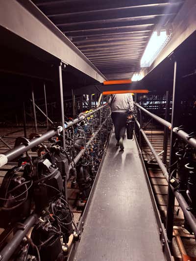 Walking the catwalk above the house, lined with dozens of instruments