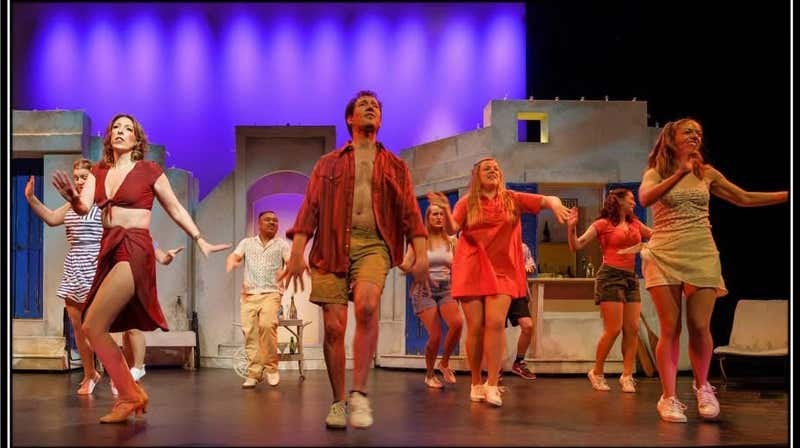 The cast in full ensemble during a production number - photo by Sherwood McLernon