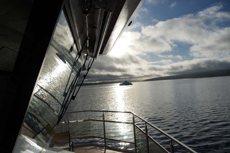 Light reflecting on the fjord waters