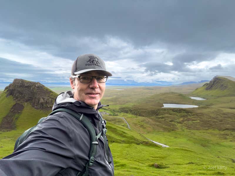 Near the summit, with the lochs of Trotternish stretching out behind me