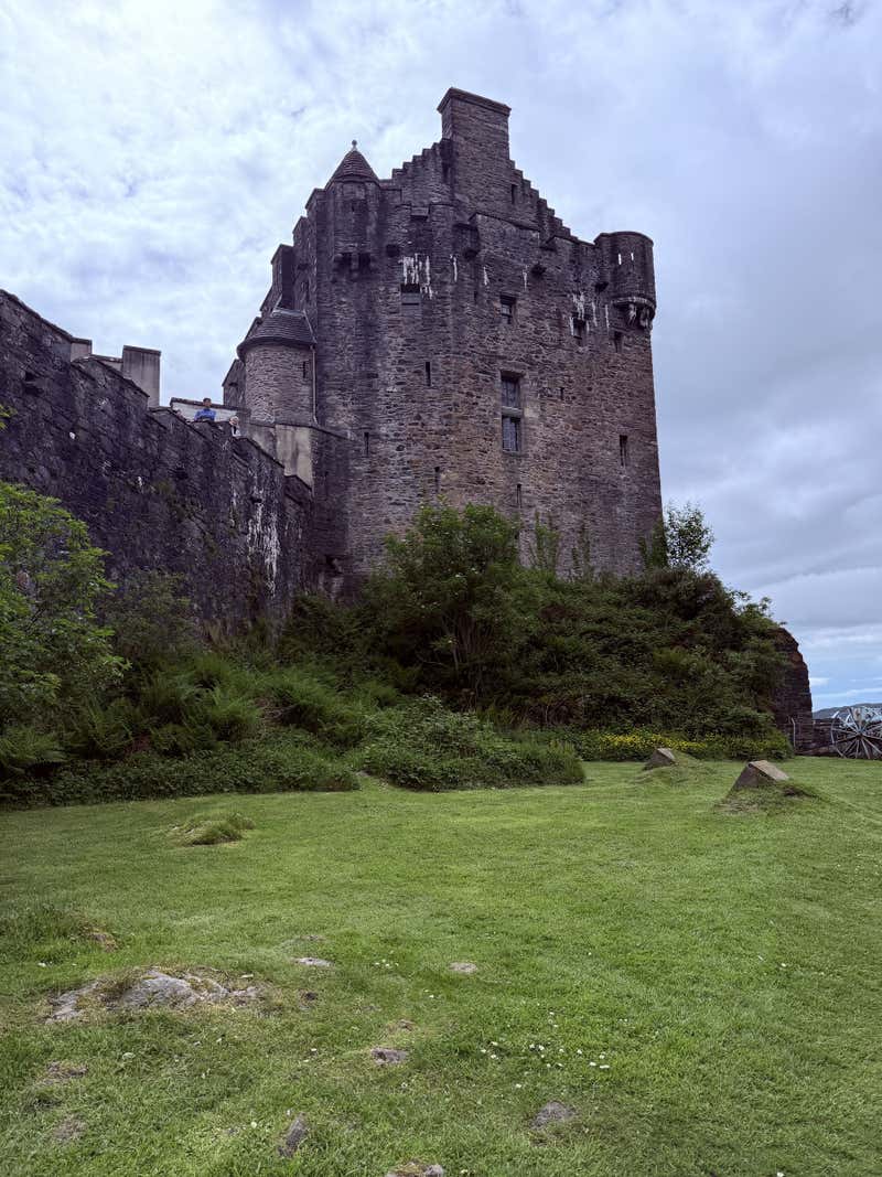 The keep rising up from the green of the castle grounds