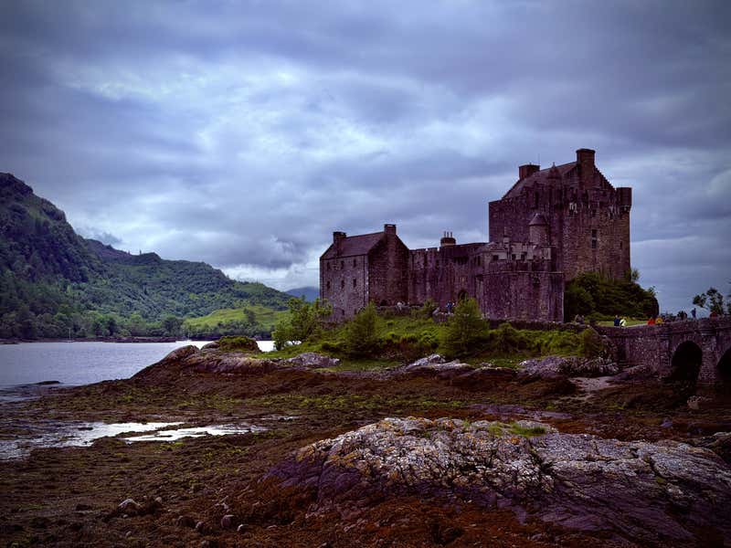 Eilean Donan on its rocky island under that moody Highland sky