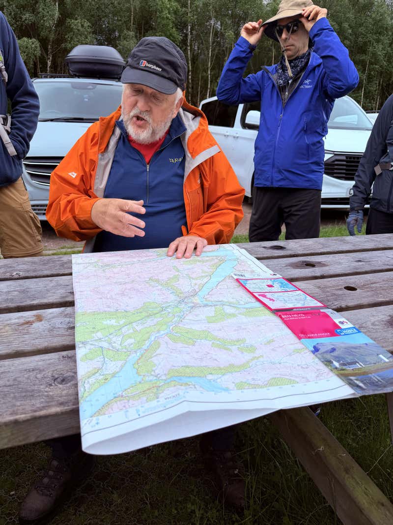 Our ranger Rory walking us through the map at the trailhead before we headed into the glen