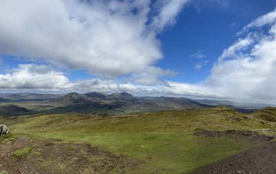 The summit moment on Ben Vrackie, sun bursting through for a full 360 degree view of Highland Perthshire