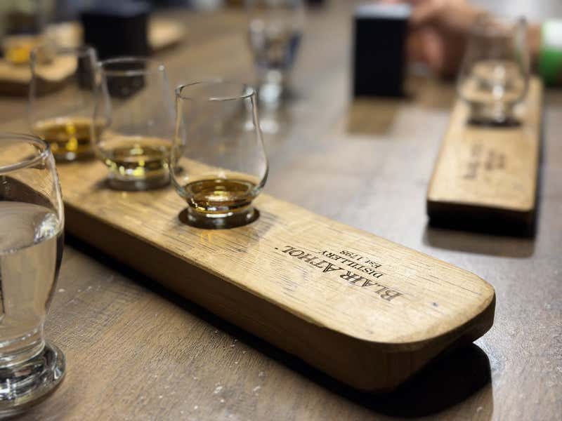 The tasting flight on a Blair Athol stave, est 1798 burned into the wood