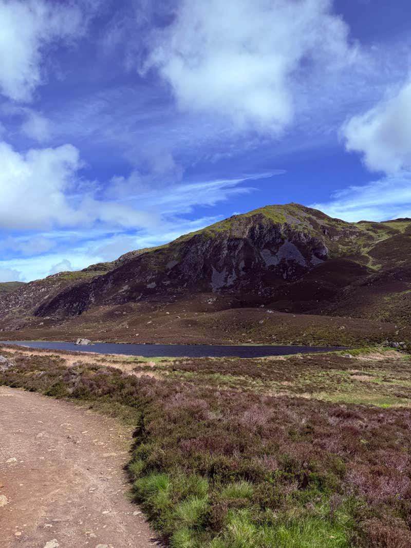A closer look from the rocky shoreline of the lochan