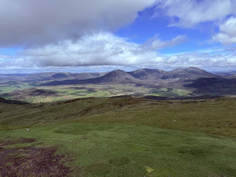 From the summit, looking out across the distant hills