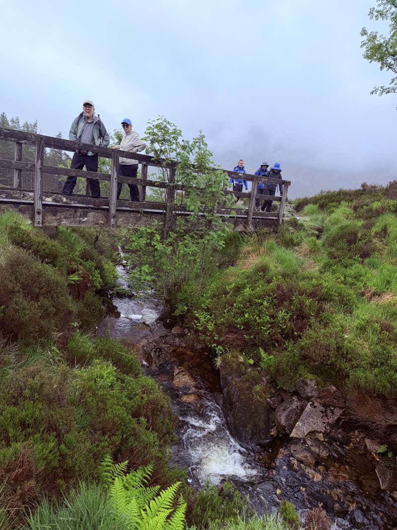 Crossing one of the wooden footbridges over a burn