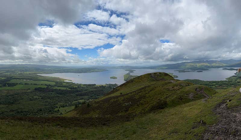 Standing on the ridge with the loch curling away on both sides