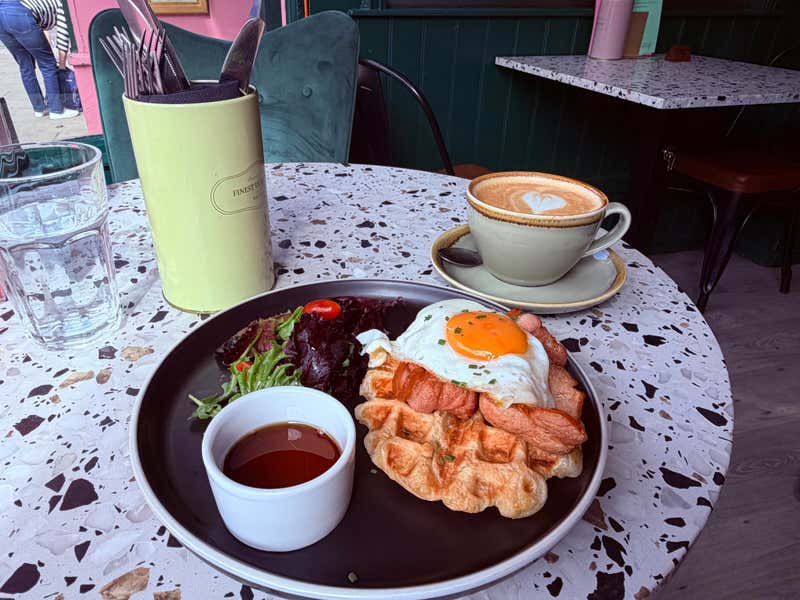 Brunch and a coffee with a heart in the foam