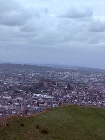 Edinburgh spread out below, the castle just visible