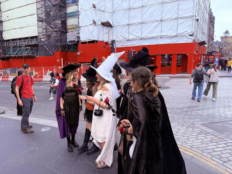 A group dressed as witches gathered on the Royal Mile