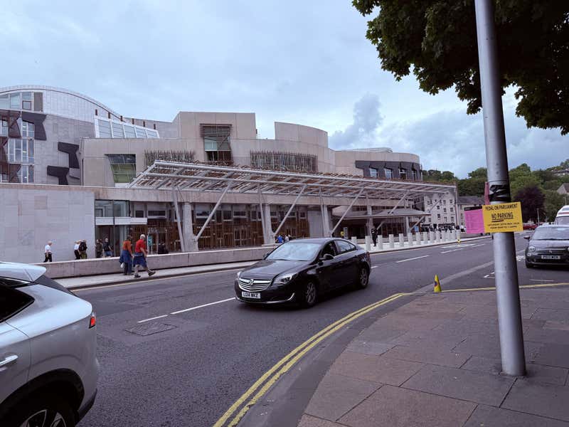 The modern lines of the Scottish Parliament building