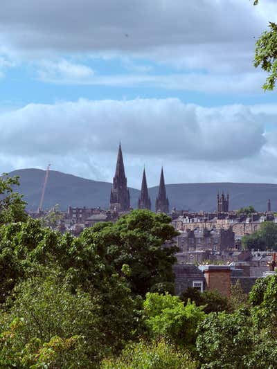 Church spires and the hills beyond the rooftops