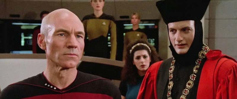 Q puts humanity on trial - Picard defends our potential