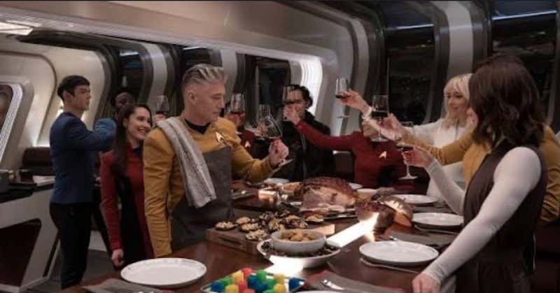 Captain Pike hosting dinner aboard the Enterprise