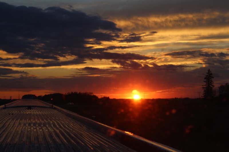 Sunset from the top of the train on the prairies
