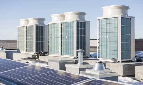Mitsubishi Electric CITY MULTI VRF outdoor units installed on a Westman Village rooftop