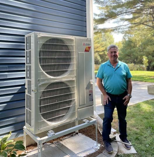 Mitsubishi Electric cold-climate heat pump installed beside a Washago home