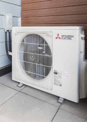 Mitsubishi Electric outdoor heating and cooling unit installed at Westman Village