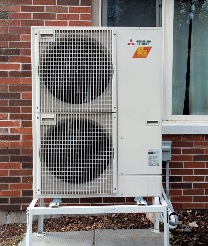 Mitsubishi Electric Zuba Central cold-climate heat pump outdoor unit at Bruce County social housing