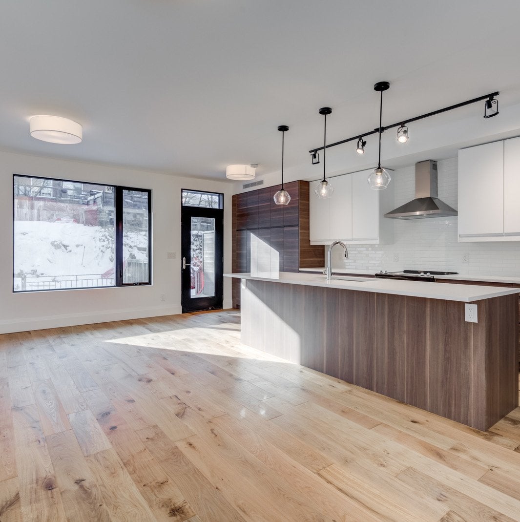 Renovated interior of the Molson Triplex in Toronto