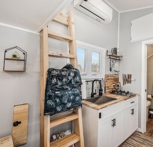 Small Living Company tiny home interior with Mitsubishi Electric wall-mounted indoor unit