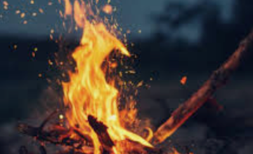 Twilight Camp Fire at Lake Rickabear Camp