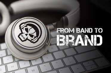 Custom die-cut band logo sticker on a pair of headphones