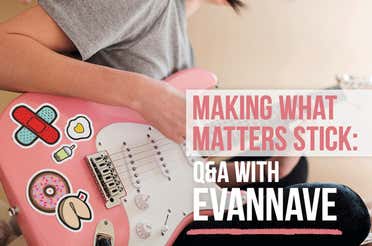 evannave's stickers on an electric guitar