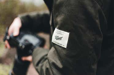 A jacket with a patch on it.