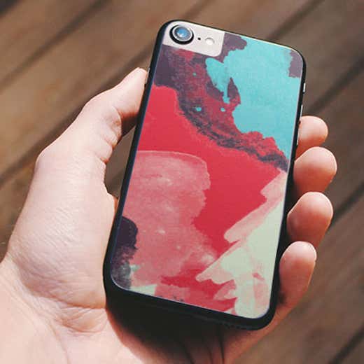 Custom vinyl iPhone skin with an artistic background