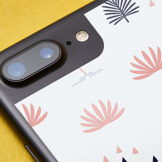 Close-up of a custom vinyl iPhone skin with an artistic pattern