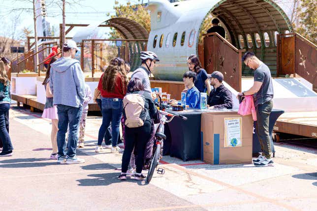 Photo of people near the small Booth